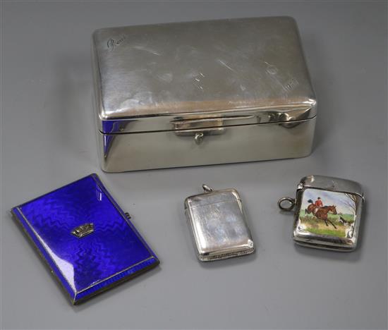 A Continental enamelled silver cigarette case, an enamelled silver vesta, silver vesta and cigarette box (4)